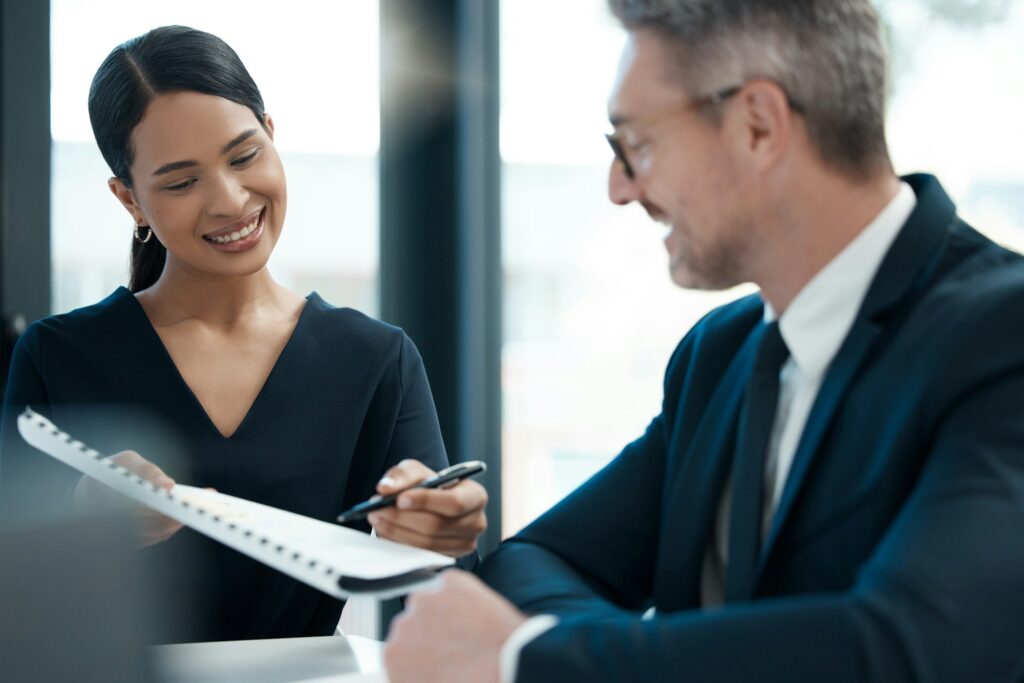 Legal, woman and lawyer in a meeting for a contract agreement for accountability in an office. Atto