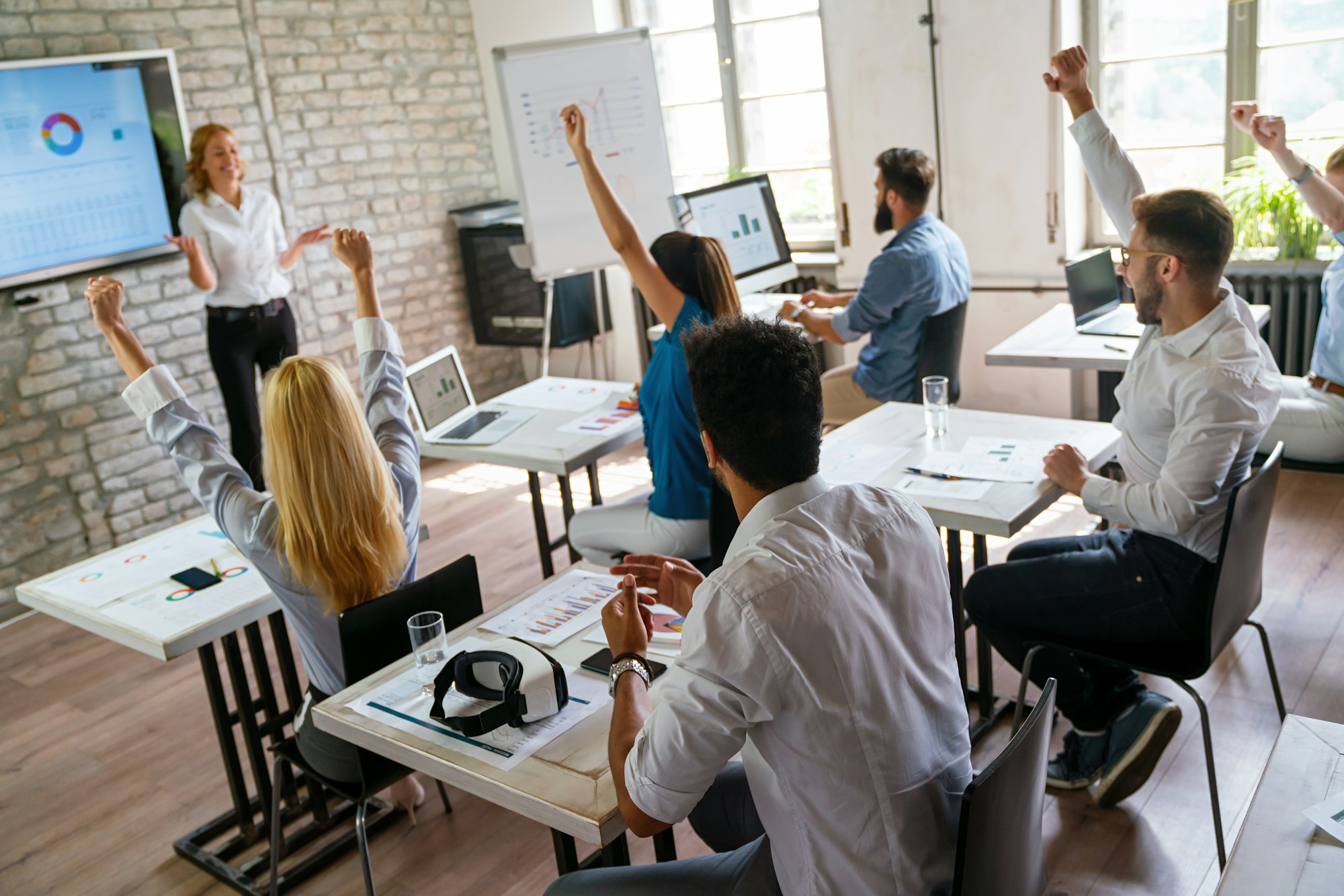 Group of multinational business people develop themselves in business training, meeting in office