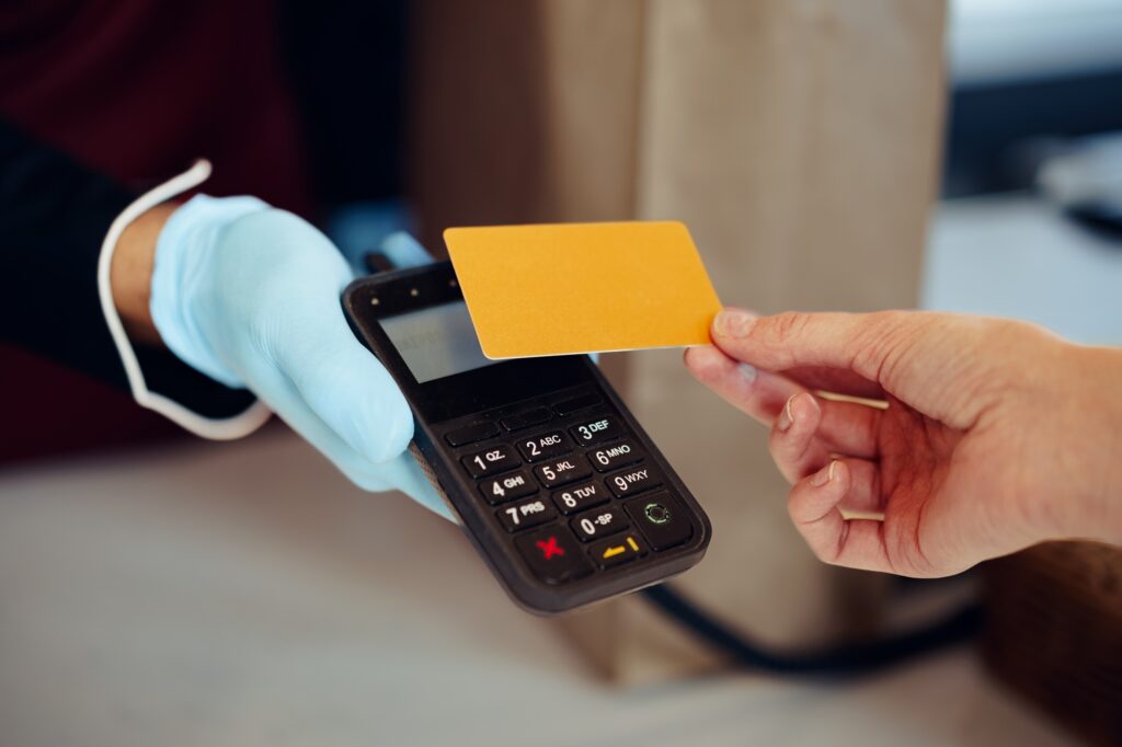 Close up of paying credit card for purchases process